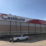BILLBOARD - FLEXIBLE PVC SIGN FOR CASHBUILD - BEING INSTALLED (2)