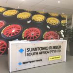 WALLPAPER AND PERSPEX SIGN ON PODS - DUNLOP HEAD OFFICE